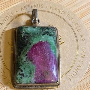 Beautiful pendant back is stamped